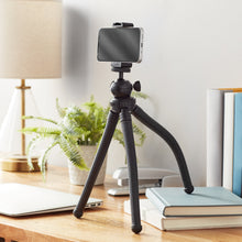Adjustable mini tripod stand with black smartphone clamp and ball head