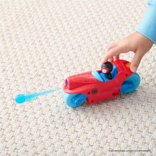Red and blue Spidey racer vehicle being pushed on carpet with blue launcher dart