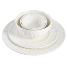 Embossed porcelain plate and deep bowl set in white, stacked
