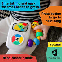 Musical take-along toy with press button, lit screen, and colorful bead chaser handle