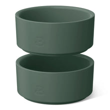 Green ceramic ramekins stacked