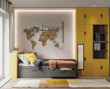 Rectangular over-the-door mirror with dark frame leaning near a bed platform