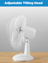 White table fan with adjustable tilting head and wire grille, on a round base