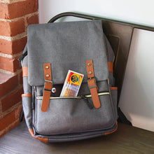 Gray backpack with a RITZ crackers and cheese dip snack pack