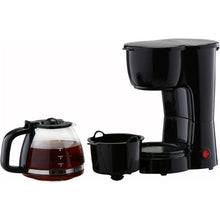 Black coffee maker with glass carafe, warming cup, and brew basket attachment