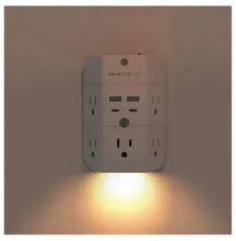 White 5-outlet power hub with USB ports, illuminated automatic night light