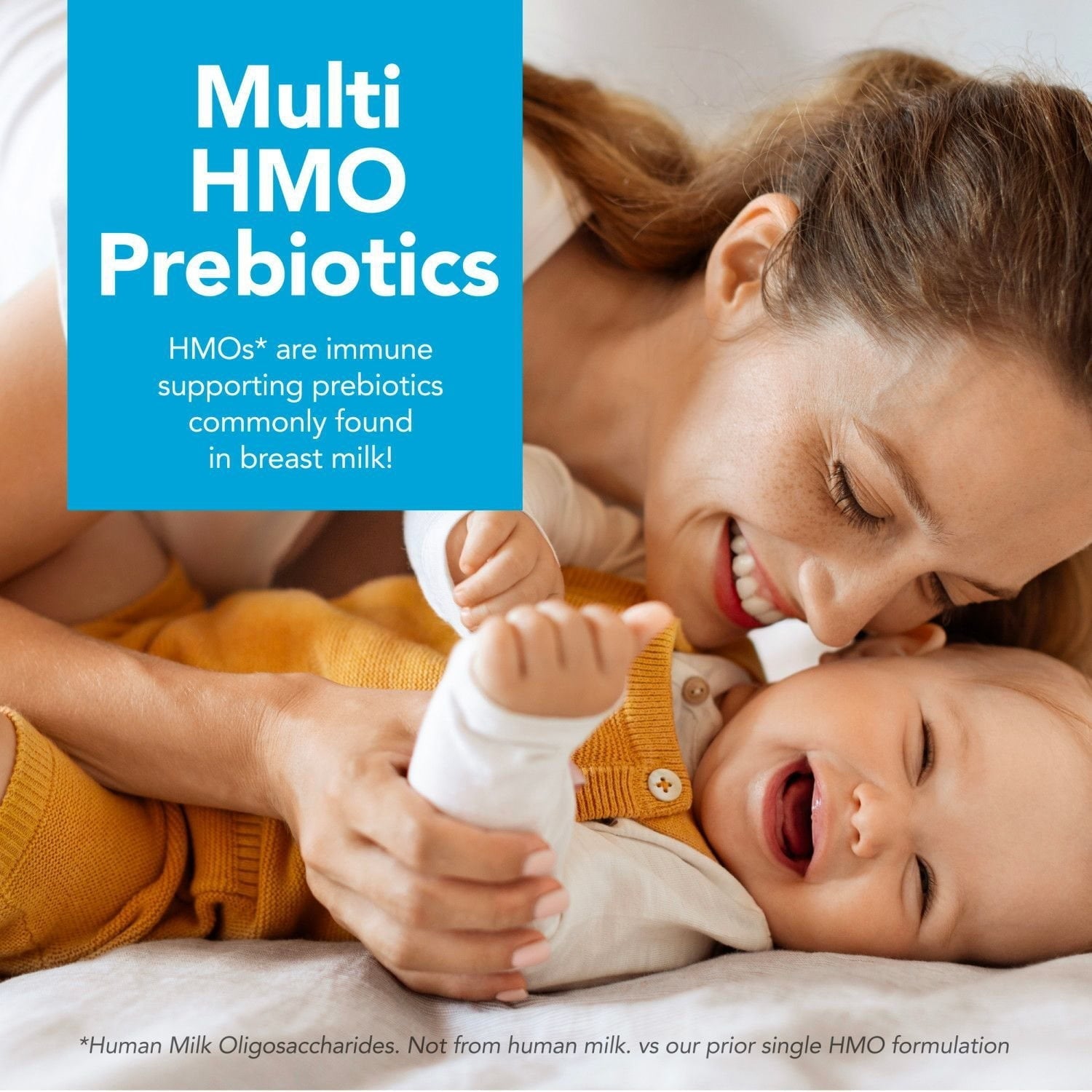 Mother holding newborn with 'Multi HMO Prebiotics' label graphic