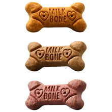 Bone-shaped peanut butter dog biscuits with embossed Milk-Bone text, assorted shades