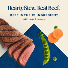 Hearty stew real beef dog food with beef slices, peas and carrots on pack