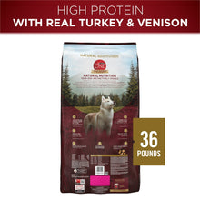 Back of dry dog food bag with natural nutrition details and 36 pounds label
