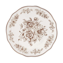 Stoneware dinner plate with central bouquet, floral wreath border, scalloped rim