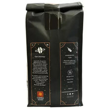 Dark roast whole bean coffee bag back, black with gold and brown info panels