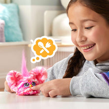 Pink mini electronic plush toy with horn-like tuft and large cartoon eyes