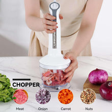 Immersion blender with chopper cup, holding chopped ingredients
