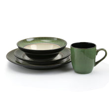 Stoneware dinnerware set with stacked bowls and plates, plus a jade green mug