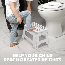 White step stool positioned under a child, showing sturdy legs and slatted top