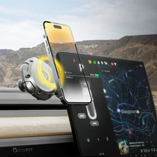 Magnetic car phone mount holding a phone upright near the dashboard and display
