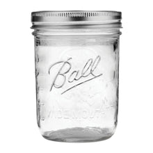 Clear glass mason jar with metal screw lid and Ball logo
