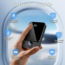 Magnetic wireless power bank held in hand with protective circuitry indicators