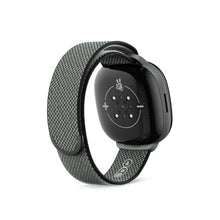 Kids LTE smartwatch with gray mesh strap, rear view with sensor and charging icons