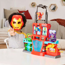 Red Iron Man playset with glowing face top and figure storage bays
