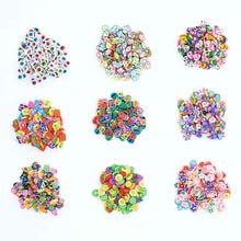 Colorful thinking putty mix-ins in small pile clusters with many tiny shapes