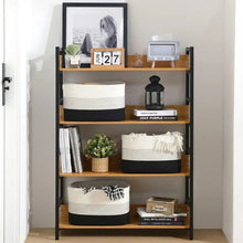 Woven storage baskets set of three, cream weave with dark bottom stripe
