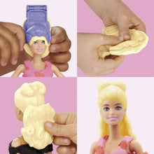 Fashion doll with interchangeable hair and head pieces in hands