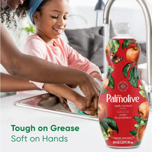 Palmolive Ultra liquid dish soap bottle with Apple Orchard label beside hand-washing