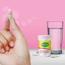 Culturelle Women’s Healthy Balance probiotic capsules bottle with capsule dispensed and water
