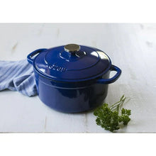 Indigo blue enameled Dutch oven with domed lid and side handles