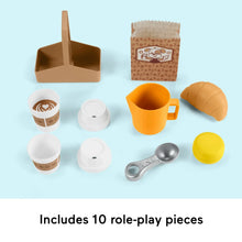 Role-play coffee set with mugs, cups, yellow pitcher, spoon, and brown cardboard tray