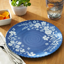 Blue daisy dinner plate with white floral pattern