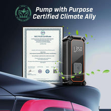 Cordless portable tire inflator on a car hood with digital pressure display