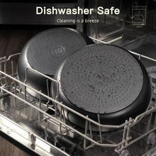 Two black nonstick pans in a dishwasher rack