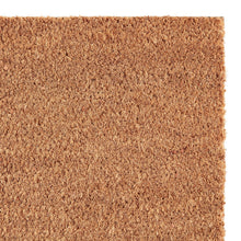 Close-up of plain brown coir doormat fibers