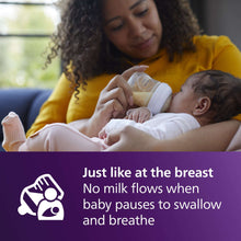 Feeding bottle with Natural Response nipple during breastfeeding, baby nursing