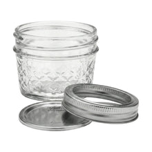 Quilted crystal mason jar with metal lid and band, clear textured glass