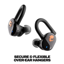 Black true wireless earbuds with curved ear hooks and orange skull icons