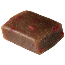 Brown peanut-butter dog treat bite, small cube shape