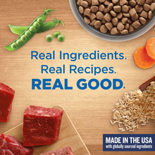 Dry dog food package with real ingredients graphics: peas, carrots, rice