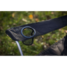 Black cup holder pocket on quad folding camp chair arm with mesh opening