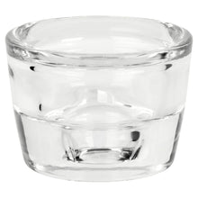 Clear glass candleholder with open top and ribbed sides, holds tealight or taper