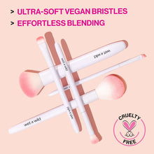 Brow and liner duo makeup brushes with soft pink bristles, white handles