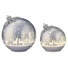 Pair of silver round glass Christmas ornaments, deer-and-tree design