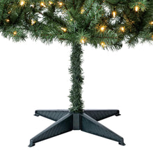 Artificial Christmas tree with green branches and warm LED lights, five-leg stand