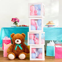 Brown teddy bear plush with teal ribbon bow, white muzzle, seated