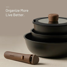 Black pot with lid and wooden knob, with matching detachable handle