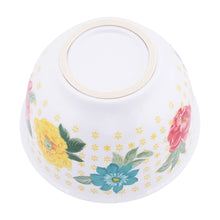 Yellow and blue floral melamine mixing bowl with cream-trimmed rim