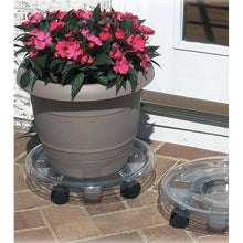 Round plant caddy with caster wheels supporting a gray planter pot